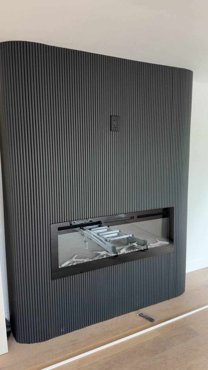 Curved Fluted Fireplace Wall