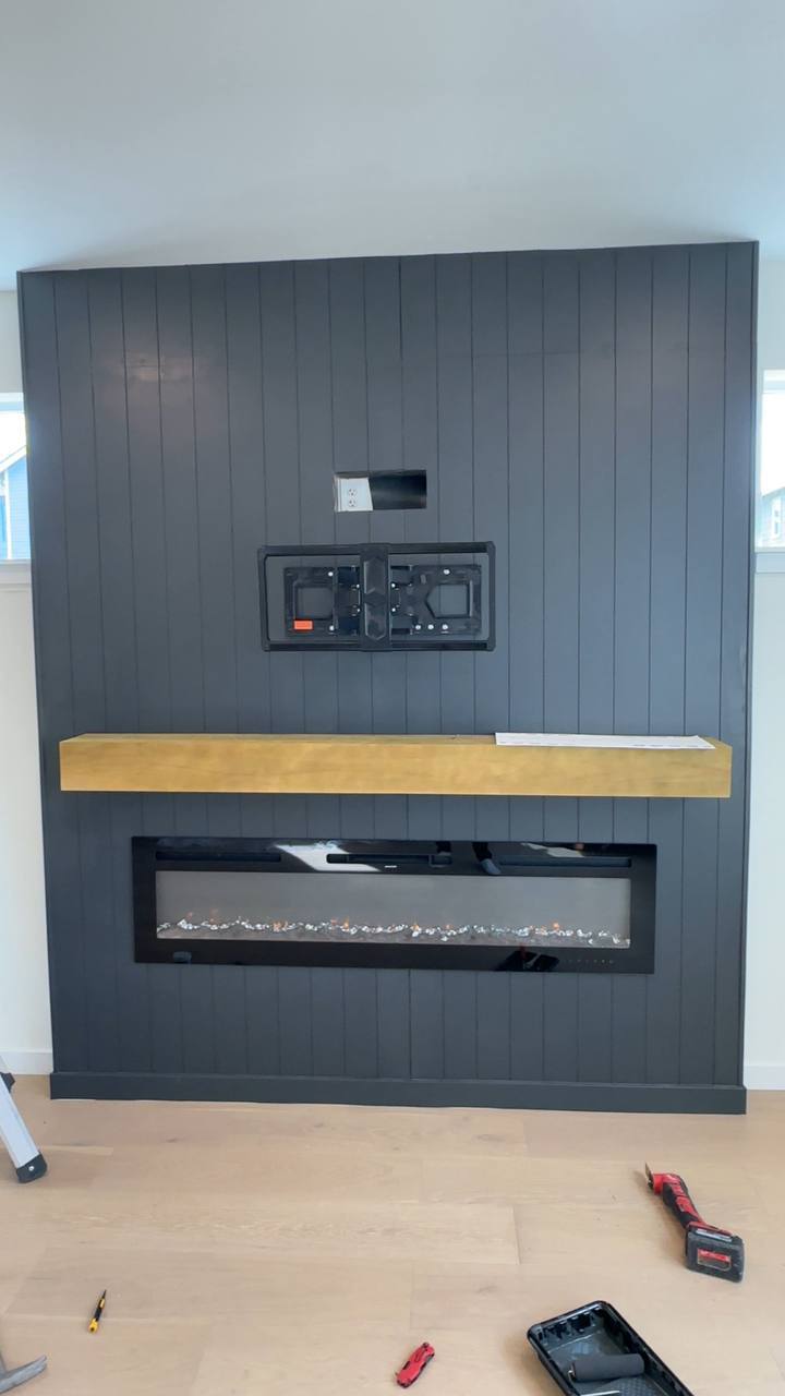 Shiplap Fireplace with Wood Mantel
